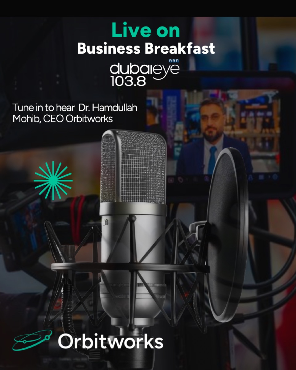 First redesign iteration of the radio announcement, on-brand navy and teal with a studio microphone.